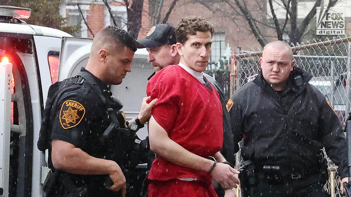 Kohberger wearing red jail issue jumpsuit