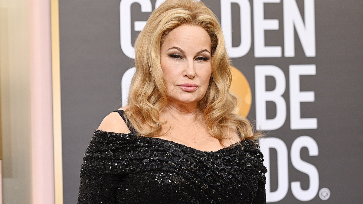 Jennifer Coolidge poses on the Golden Globes red carpet