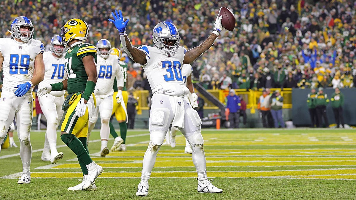 Jamaal Williams celebrates touchdown