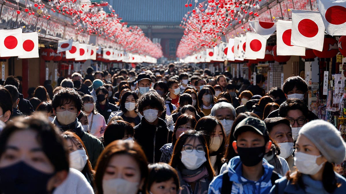 People in Japan masking against COVID