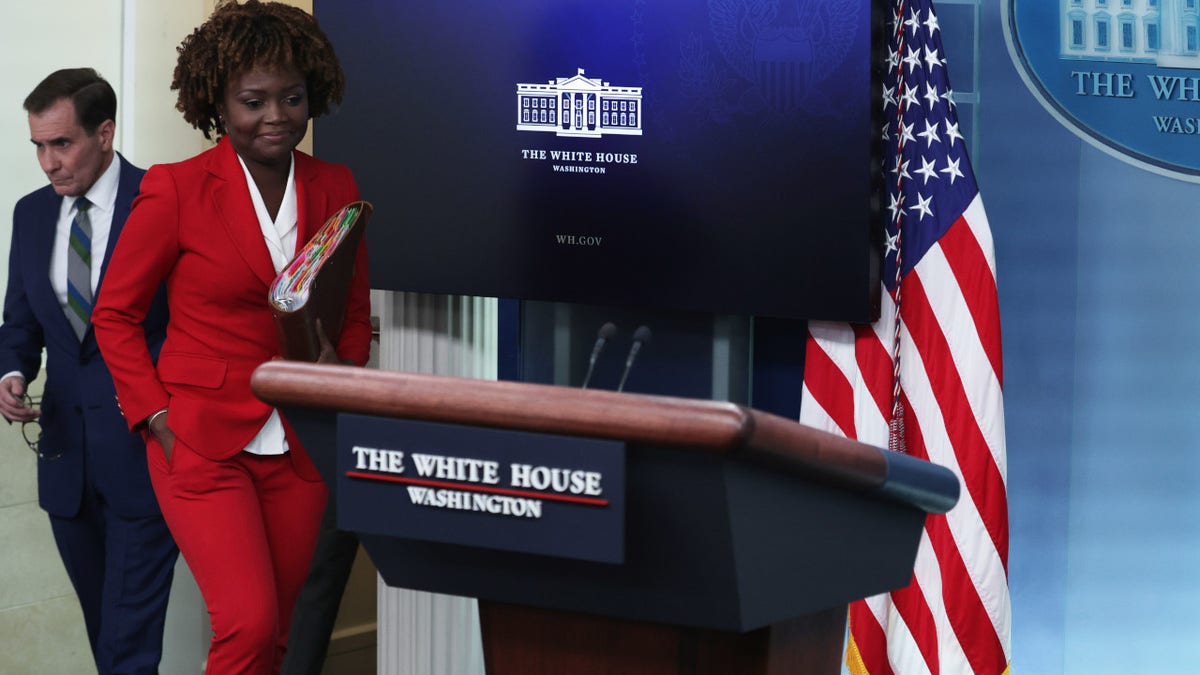 White House Press Secretary Karine Jean-Pierre and Coordinator for Strategic Communications at the National Security Council John Kirby arrive at a White House daily news briefing at the James S. Brady Press Briefing Room of the White House on January 20, 2023 in Washington, DC.