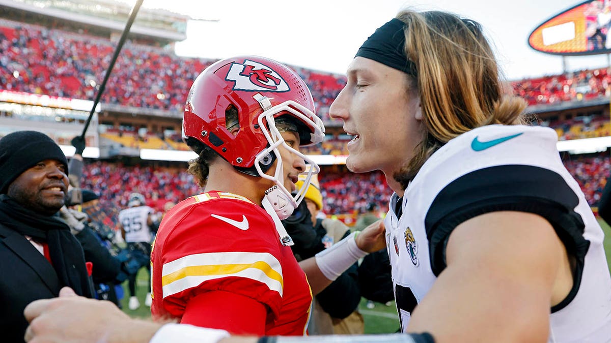 Patrick Mahomes of the Kansas City Chiefs, left, hugs Trevor Lawrence of the Jacksonville Jaguars after the Chiefs defeated the Jaguars 27-17 at Arrowhead Stadium Nov. 13, 2022, in Kansas City, Mo. 