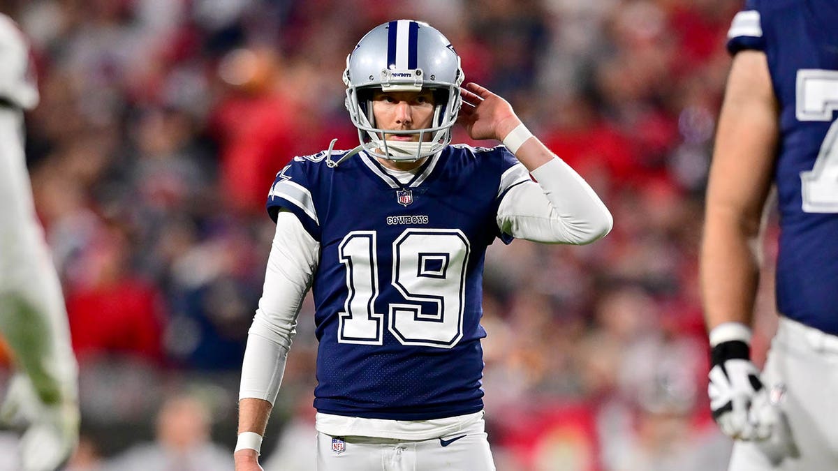 Dallas Cowboys kicker Brett Maher reacts on the football field