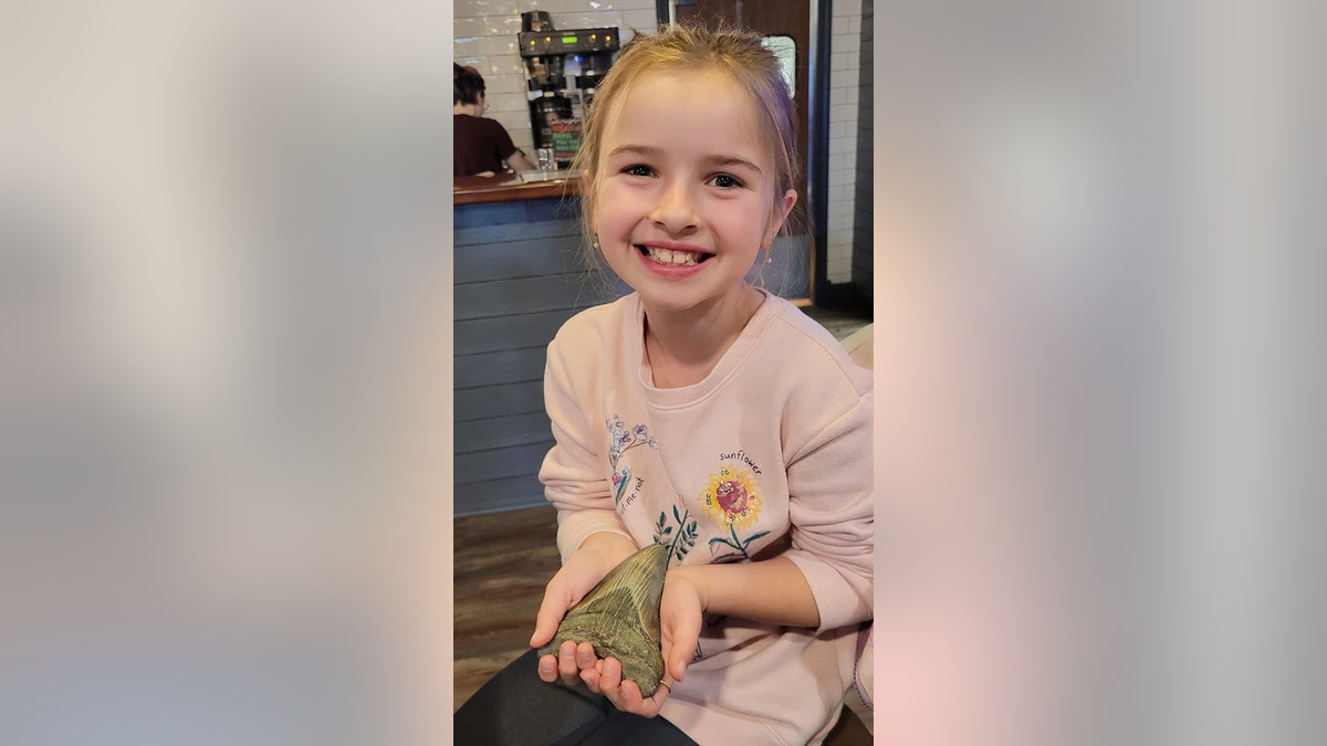 molly with megalodon tooth