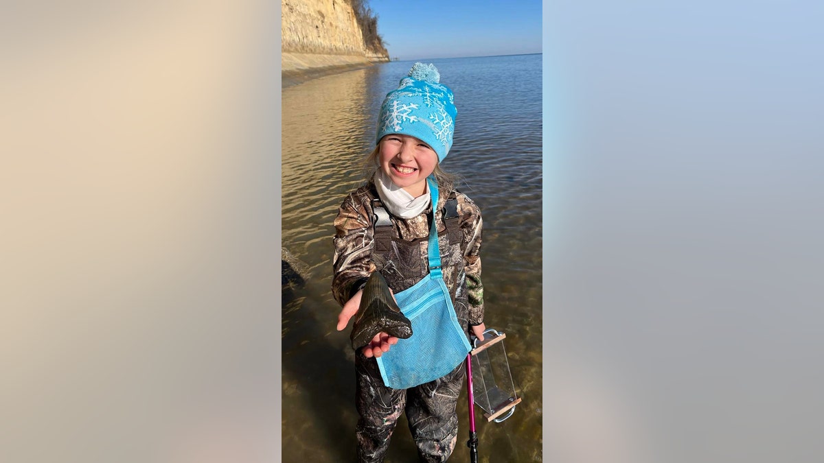 molly with megalodon tooth