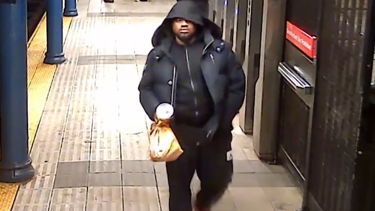 suspect walking on subway platform