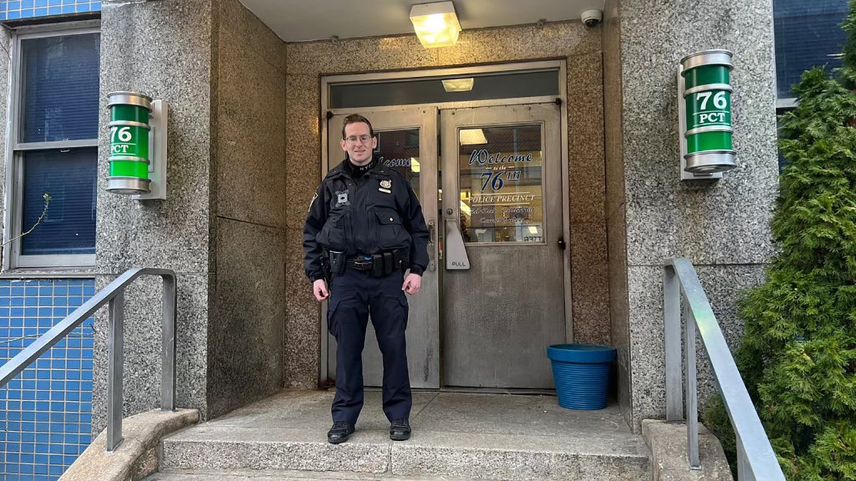 Officer Green outside 76th Precinct in Brooklyn