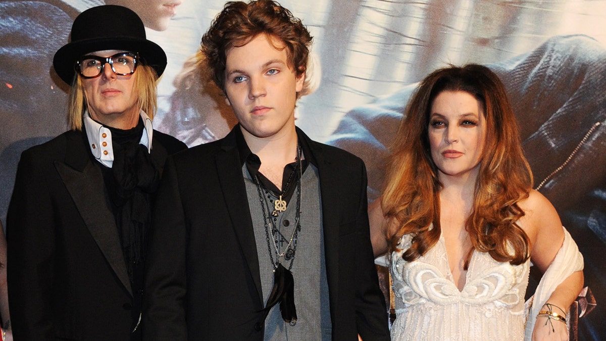 Michael Lockwood, Ben Keough and Lisa Marie Presley seen at the premiere of "Harry Potter And The Deathly Hallows: Part 1" in 2010.