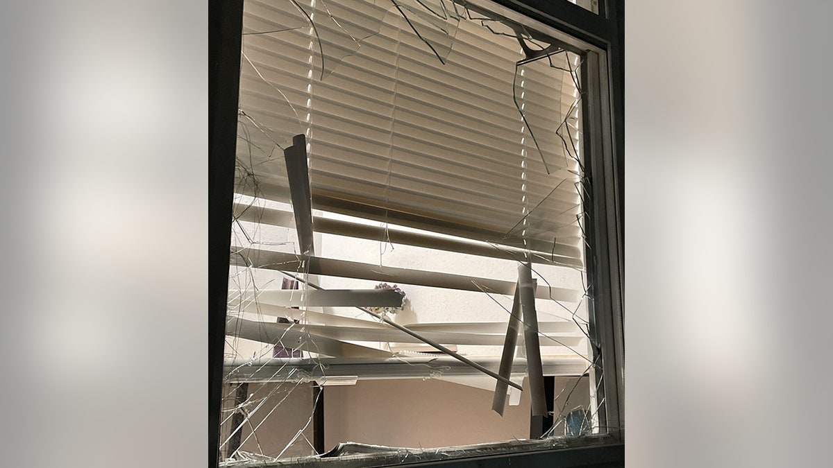 broken window of Seattle residence