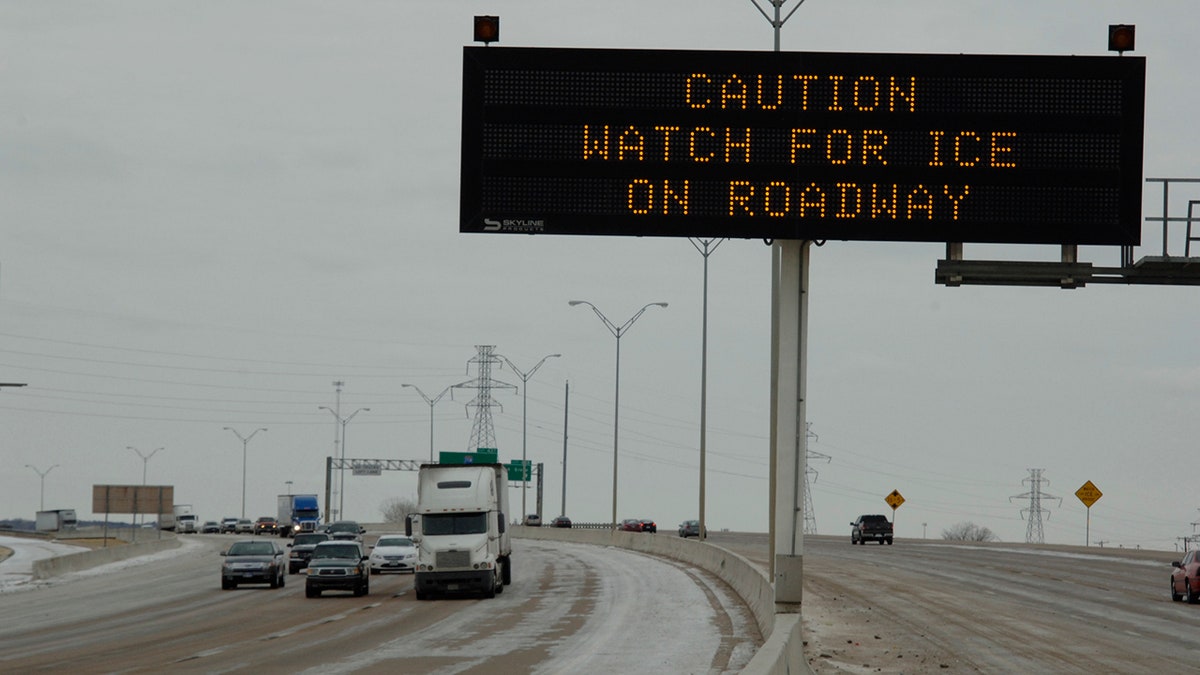 cars driving on icy road