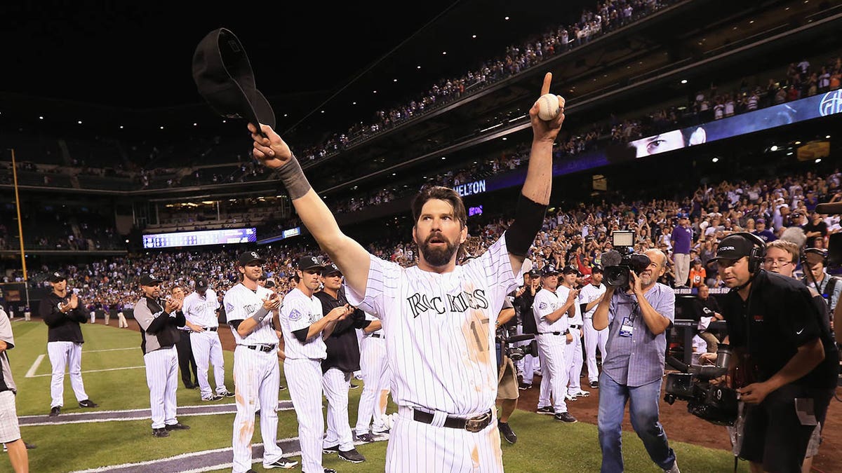 Todd Helton waves after last game