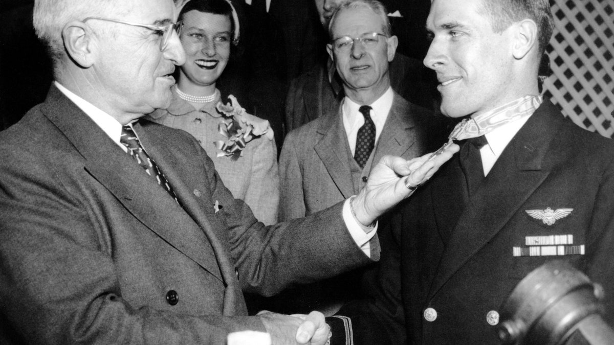 Lt. Tom Hudner receiving the Medal of Honor from President Harry Truman.