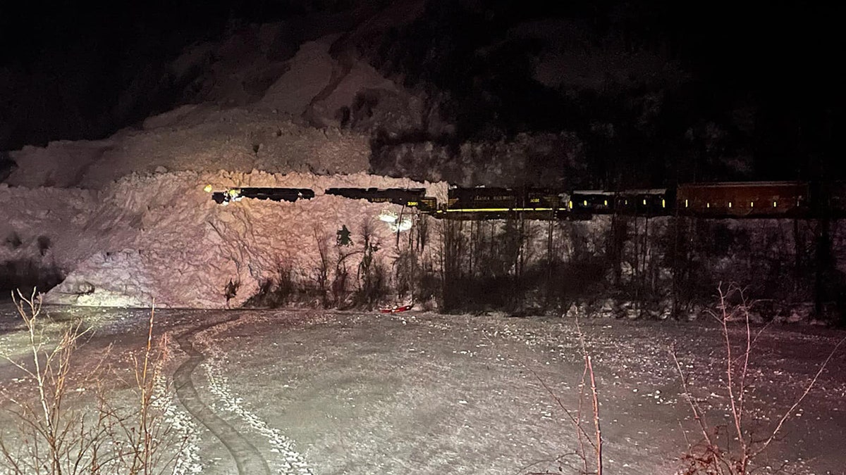 train stuck in avalanche debris