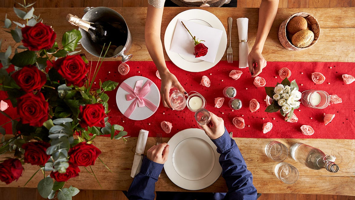 couple sat around a table for their valentine's day meal