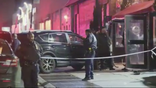 SUV sits idle on sidewalk