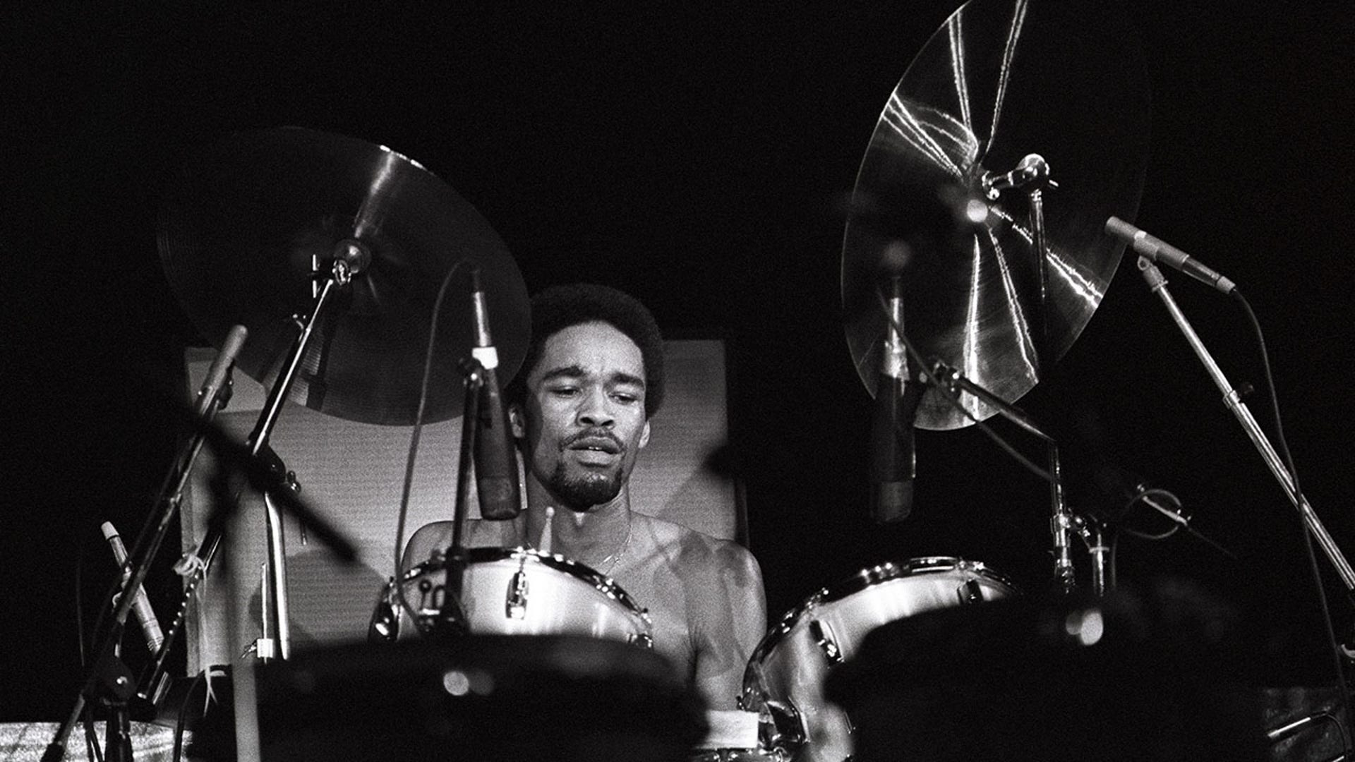 Fred White playing drums