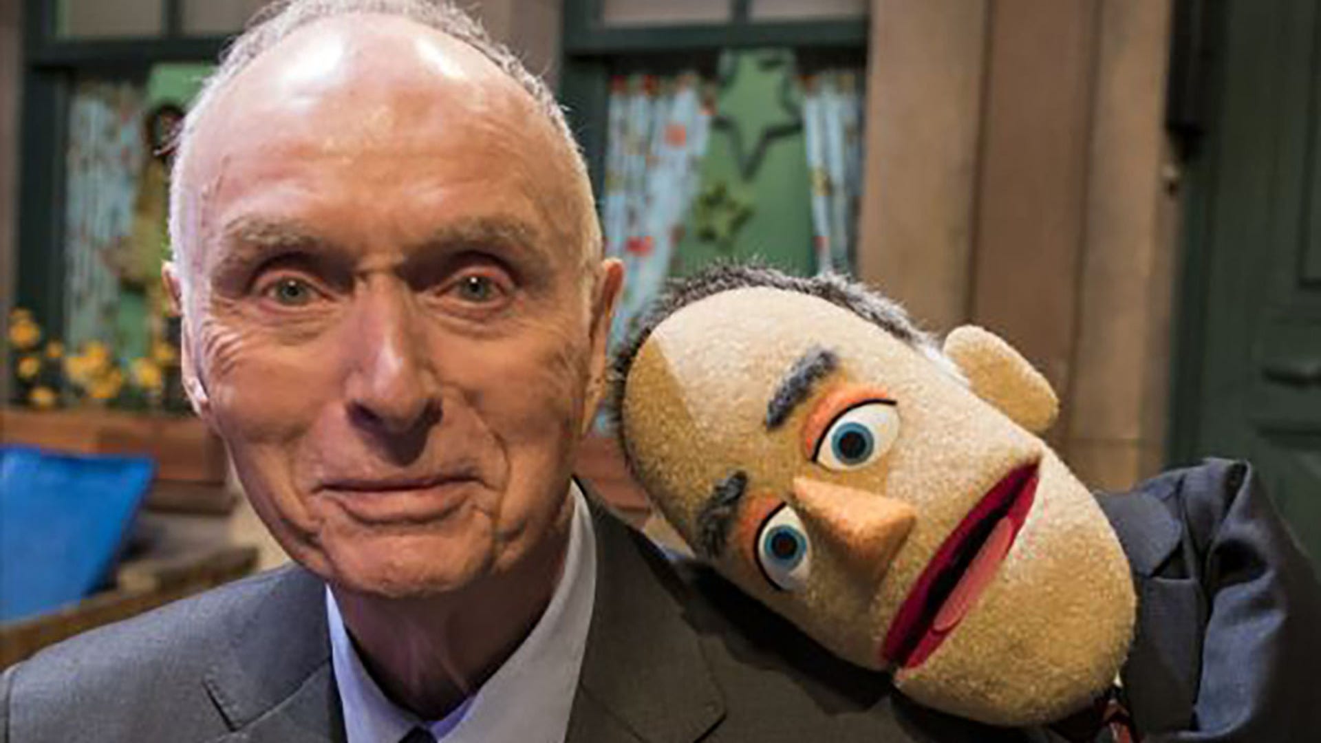 Lloyd Morrisett with a muppet