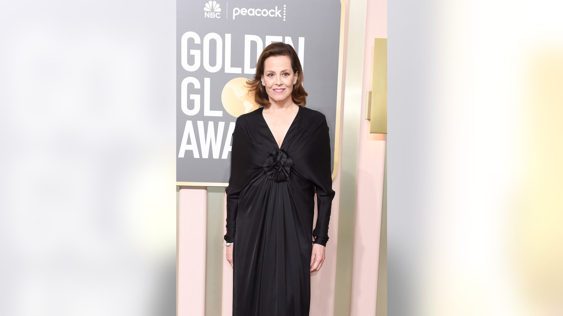 Sigourney Weaver in all black