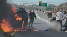 Video shows Good Samaritans rescuing woman from burning car on New York highway