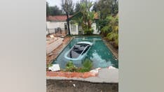 California driver crashes through wall into Pasadena pool with 3 people inside, including child