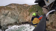 Dramatic video shows California helicopter rescue after Tesla plunges off 'Devil's Slide' cliff