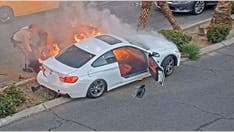 Las Vegas police officer, good Samaritan pull crashed motorist to safety moments before car bursts into flames
