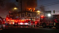 LA officials were trying to investigate a battery suspect when a fire erupted on the building