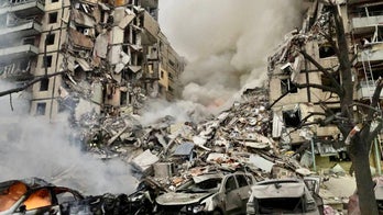 Dozens trapped and injured after Russia struck 9-story apartment building in Ukraine's Dnipro