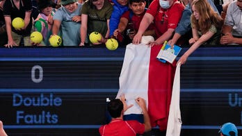 Australian Open bans Russian, Belarusian flags after incident