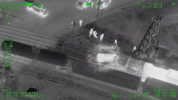 Georgia man crashes stolen Atlanta police car on railroad tracks, officers rescue him from oncoming train