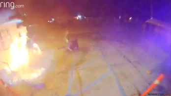 California arsonists set themselves on fire while attacking business, video shows