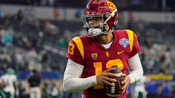 USC's Caleb Williams scrambles from Tulane defenders to make impressive throw to wide receiver