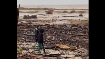California beach littered with debris, video shows, as 'endless onslaught' of storms continue