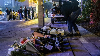 Chinese police arrest man who plowed into crowd, killing 5 people, injuring others