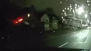 Michigan police dashcam video captures alleged drunk driver's car flying through air during crash