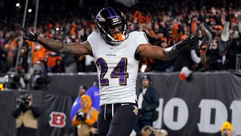 Ravens' Marcus Peters appears to strike Bengals' Joe Mixon after tackle, penalized for taunting