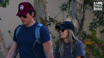 Halyna Hutchins' widower seen on walk after Alec Baldwin charged with involuntary manslaughter