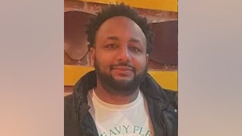 Missing Atlanta man identified as body found burning in woods