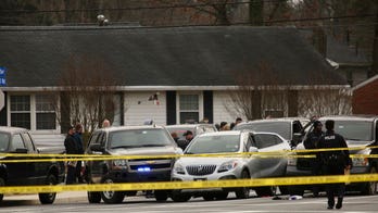 Virginia homicide suspect killed and deputy wounded in shootout