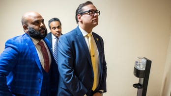 Santos admits he dressed up as a woman for ‘fun,’ but denies being a drag queen