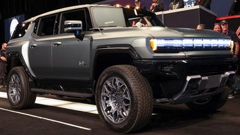 First GMC Hummer EV SUV auctioned for $500,000 as production begins