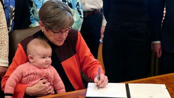 Kansas Gov. Kelly COVID positive, State of the State address delayed