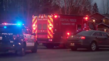 Two Washington police officers shot during 6-hour standoff with man barricaded in ex’s apartment