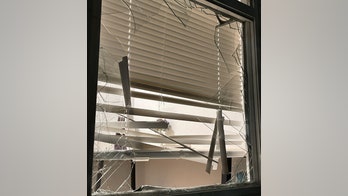 Seattle woman returns home to find smashed window, burglary suspect taking bath fully clothed: police