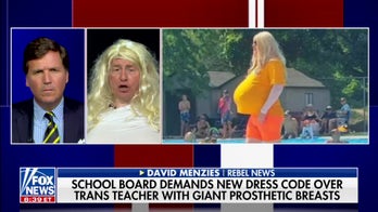 Tucker Carlson guest dresses as trans teacher with giant prosthetic breasts to ridicule Ontario school drama