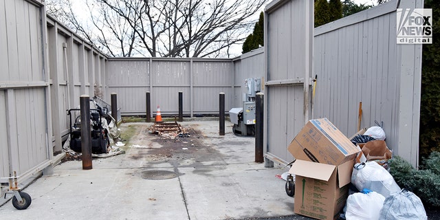 Police removed the dumpster, located at the home of Diane Walshe, to inspect for evidence on Tuesday, January 10, 2023 in Swampscott, MA. 