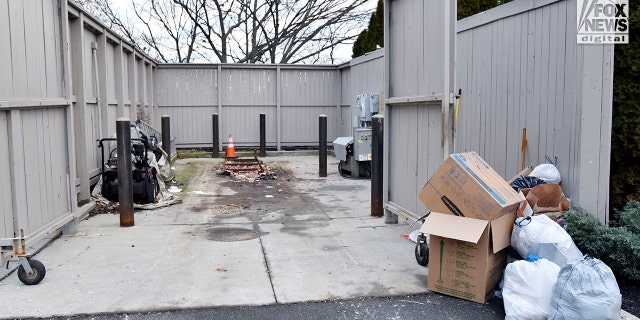 Police removed the dumpster, located at the home of Diane Walshe, to inspect for evidence on Tuesday, January 10, 2023 in Swampscott, MA. 