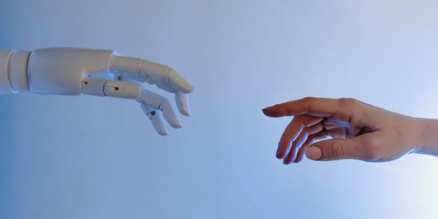 Human &amp; Robot Hand recreates Michelangelo's "The Creation of Adam" Painting