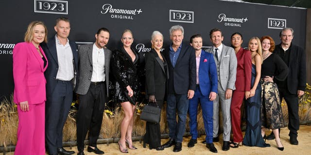 From left, Jennifer Ehle, James Badge Dale, Brian Geraghty, Marley Shelton, Helen Mirren, Harrison Ford, Darren Mann, Sebastian Roché, Aminah Nieves, Michelle Randolph, Kerry O'Malley and Timothy Dalton attend the Los Angeles premiere of "1923."