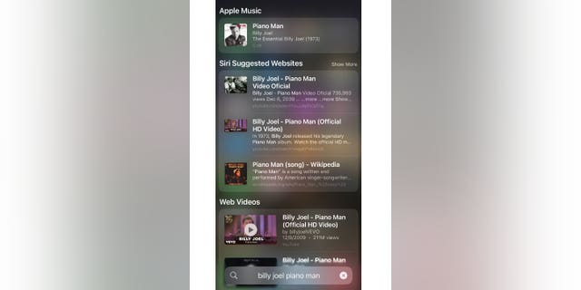 An example of how to search for content on your Apple device. In this case, Billy Joel's "Piano Man."